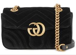 Crossbody velvet black bag with gold chain strap for woman.